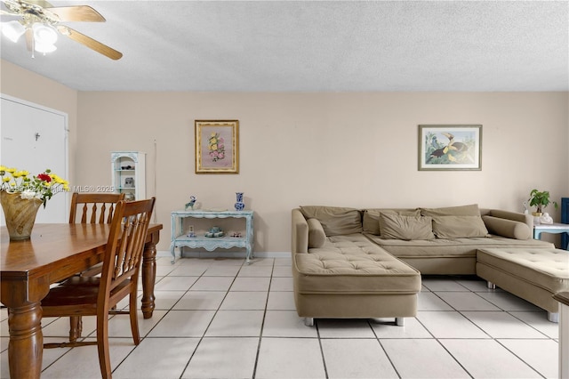 325 NW 72nd Ave Unit 308, Miami, FL 33126 - living area with ceiling fan, light tile patterned floors, and a textured ceiling