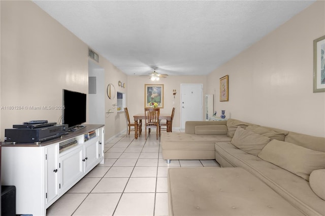 325 NW 72nd Ave Unit 308, Miami, FL 33126 - living area featuring ceiling fan, light tile patterned floors, and baseboards