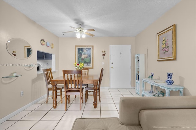 325 NW 72nd Ave Unit 308, Miami, FL 33126 - dining room featuring ceiling fan, light tile patterned floors, a textured ceiling, and baseboards