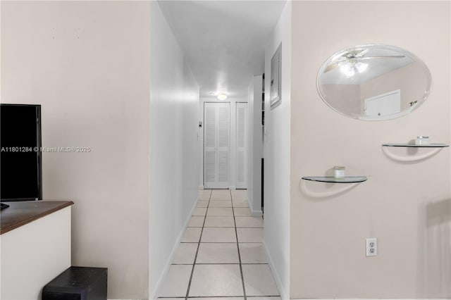 325 NW 72nd Ave Unit 308, Miami, FL 33126 - corridor featuring light tile patterned flooring and baseboards