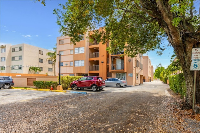 325 NW 72nd Ave Unit 308, Miami, FL 33126 - view of apartment building / complex with uncovered parking