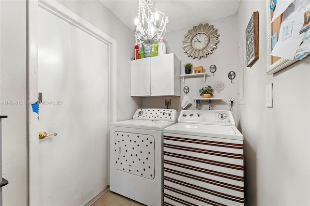 2421 NW 102nd Way, Pembroke Pines, FL 33026 - clothes washing area with cabinet space, independent washer and dryer, and a textured ceiling