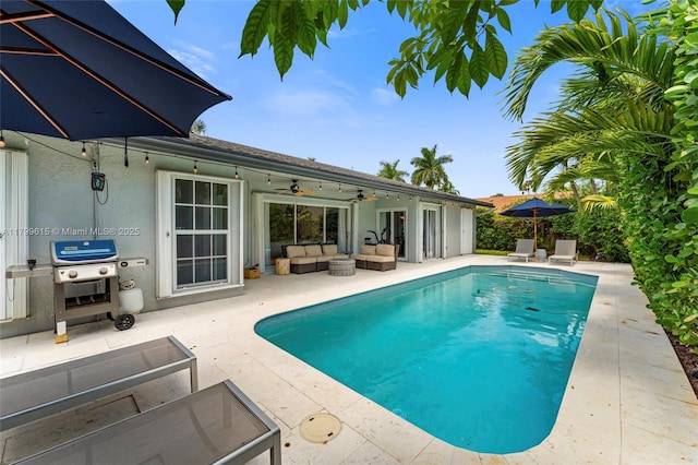 2421 NW 102nd Way, Pembroke Pines, FL 33026 - swimming pool featuring an outdoor living space, a patio, area for grilling, and ceiling fan