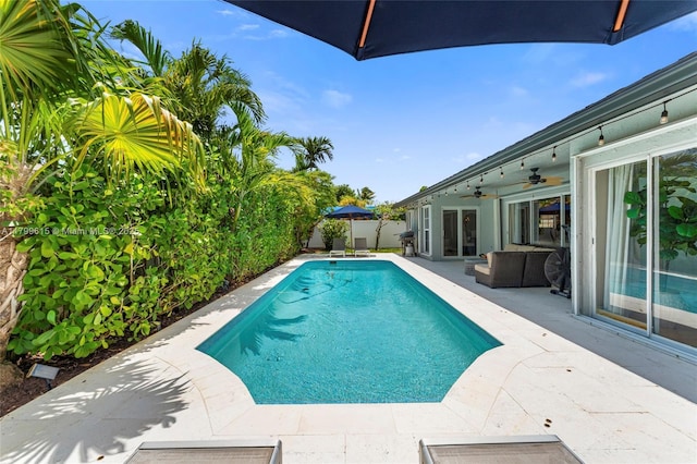 2421 NW 102nd Way, Pembroke Pines, FL 33026 - view of pool featuring a patio, a ceiling fan, grilling area, and french doors