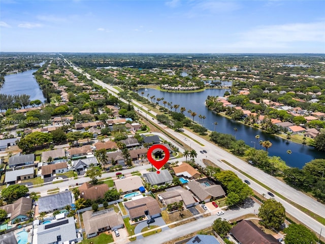 2421 NW 102nd Way, Pembroke Pines, FL 33026 - aerial view of property and surrounding area featuring a nearby body of water and nearby suburban area