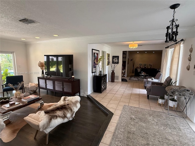 9720 SW 104th Ct, Miami, FL 33176 - living area featuring ornamental molding, light tile patterned floors, recessed lighting, and a textured ceiling