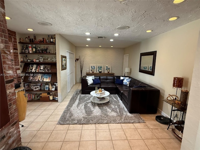 9720 SW 104th Ct, Miami, FL 33176 - living area with a textured ceiling, light tile patterned flooring, recessed lighting, and baseboards