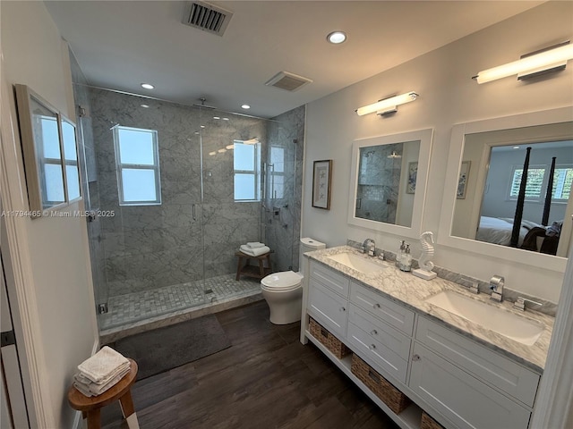 9720 SW 104th Ct, Miami, FL 33176 - ensuite bathroom featuring toilet, a stall shower, wood finished floors, double vanity, and recessed lighting