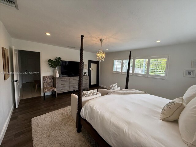 9720 SW 104th Ct, Miami, FL 33176 - bedroom with dark wood-style flooring, recessed lighting, a chandelier, and baseboards