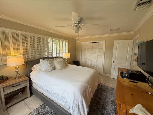 9720 SW 104th Ct, Miami, FL 33176 - bedroom with light tile patterned floors, a closet, crown molding, and a ceiling fan