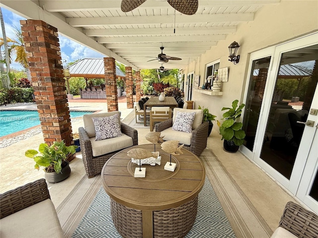 9720 SW 104th Ct, Miami, FL 33176 - view of patio / terrace with ceiling fan, an outdoor pool, a gazebo, and an outdoor hangout area