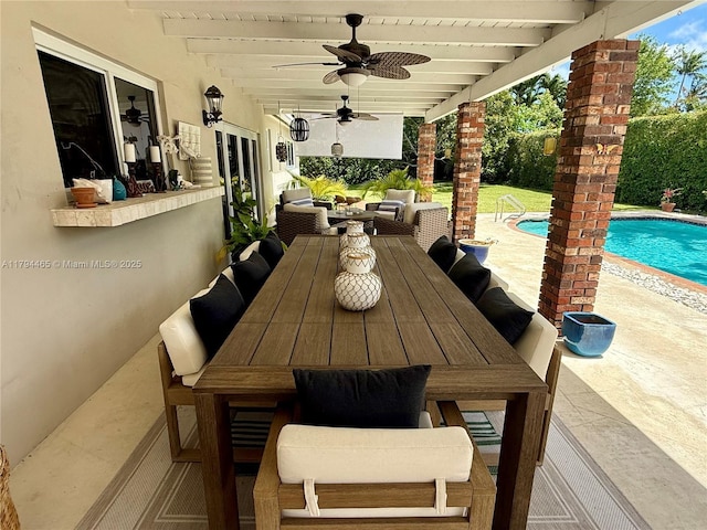 9720 SW 104th Ct, Miami, FL 33176 - view of patio with outdoor dining area, a ceiling fan, and an outdoor pool