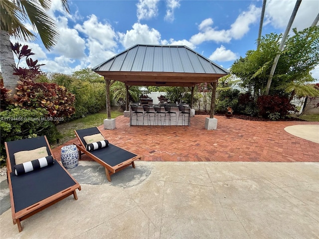 9720 SW 104th Ct, Miami, FL 33176 - view of home's community featuring a gazebo, a patio, and an outdoor kitchen