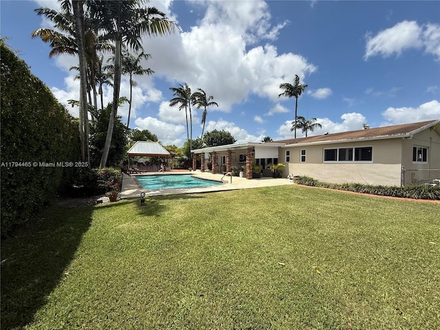 9720 SW 104th Ct, Miami, FL 33176 - swimming pool with a gazebo, a lawn, and a patio