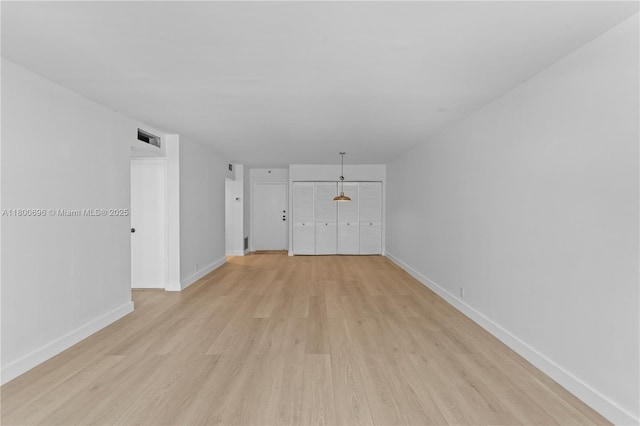 9511 Collins Ave Unit 806, Surfside, FL 33154 - unfurnished room featuring light wood finished floors and baseboards