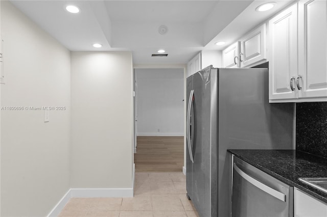 9511 Collins Ave Unit 806, Surfside, FL 33154 - kitchen featuring dishwasher, recessed lighting, baseboards, white cabinets, and dark stone countertops