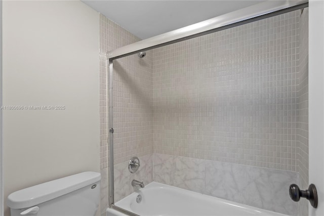 9511 Collins Ave Unit 806, Surfside, FL 33154 - full bath with shower / bath combination with glass door and toilet