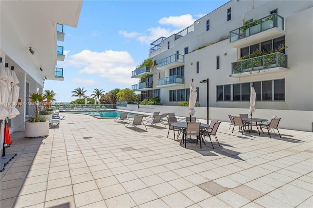 9511 Collins Ave Unit 806, Surfside, FL 33154 - community pool featuring a patio area