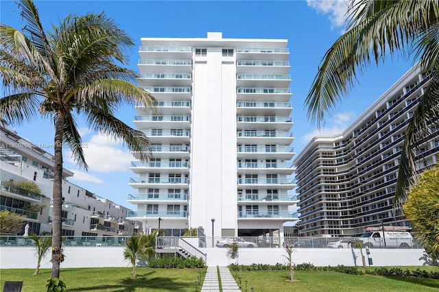 9511 Collins Ave Unit 806, Surfside, FL 33154 - view of apartment building / complex featuring fence