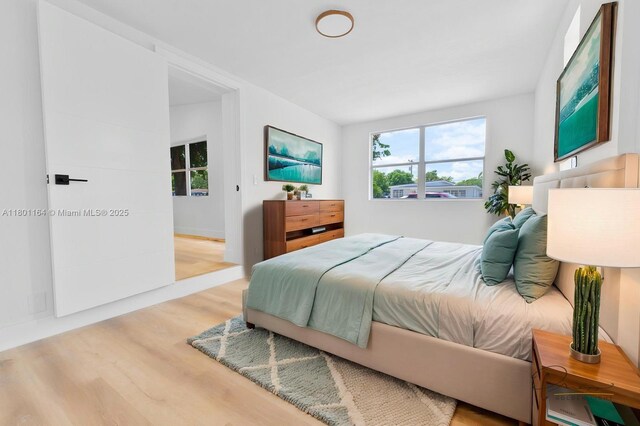 75 NW 125th St, North Miami, FL 33168 - bedroom featuring wood finished floors