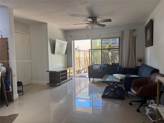 4360 NW 79th Ave Unit 1F, Doral, FL 33166 - living area with a ceiling fan and light tile patterned floors
