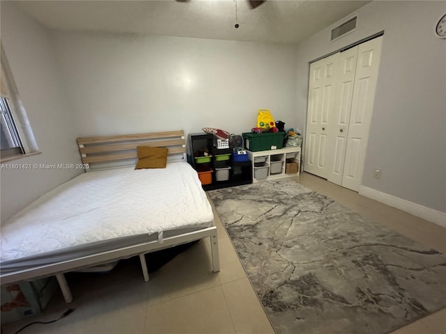 4360 NW 79th Ave Unit 1F, Doral, FL 33166 - bedroom featuring a closet and a ceiling fan
