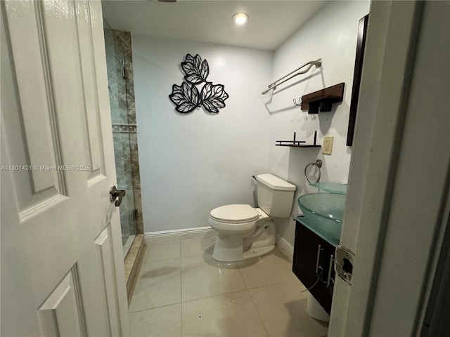 4360 NW 79th Ave Unit 1F, Doral, FL 33166 - bathroom with vanity, tile patterned flooring, and a shower