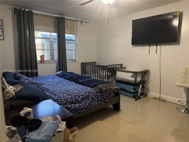 4360 NW 79th Ave Unit 1F, Doral, FL 33166 - bedroom with tile patterned floors and a ceiling fan