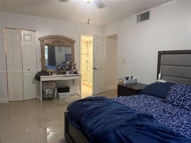 4360 NW 79th Ave Unit 1F, Doral, FL 33166 - bedroom featuring a ceiling fan, tile patterned floors, and ensuite bathroom