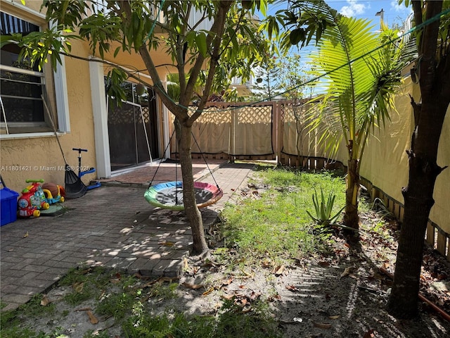 4360 NW 79th Ave Unit 1F, Doral, FL 33166 - view of yard featuring a patio
