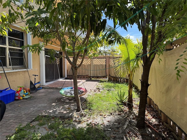 4360 NW 79th Ave Unit 1F, Doral, FL 33166 - fenced backyard with a patio