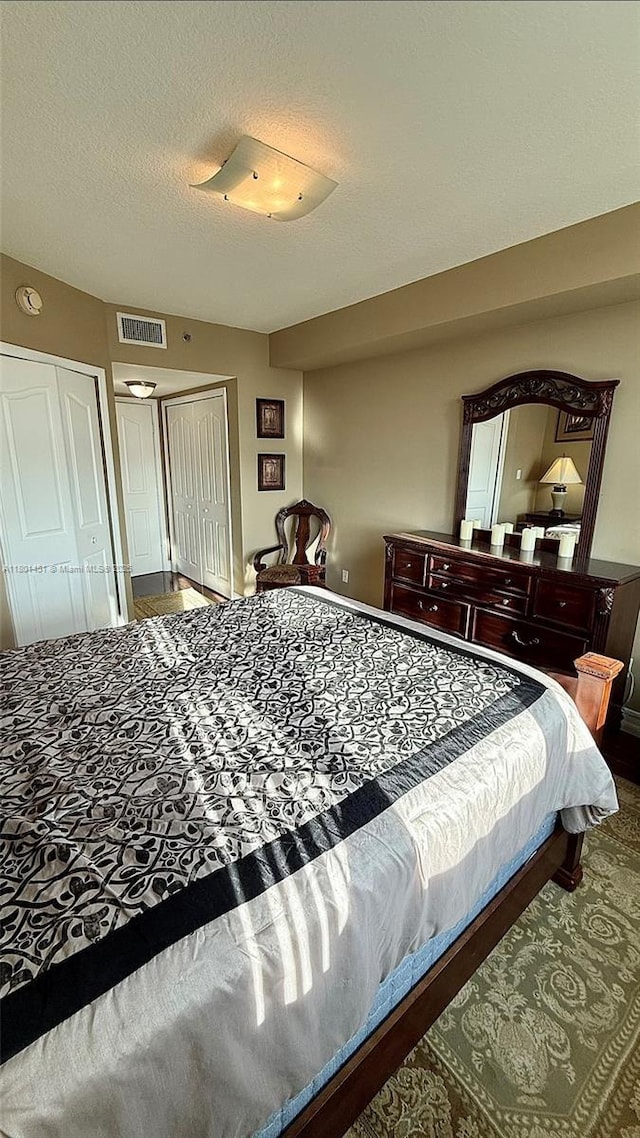 2665 SW 37th Ave Unit 1112, Miami, FL 33133 - bedroom with a textured ceiling
