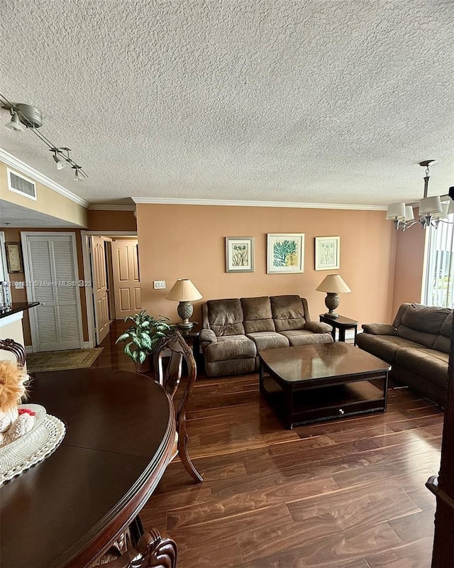 2665 SW 37th Ave Unit 1112, Miami, FL 33133 - living area with crown molding, a textured ceiling, a chandelier, track lighting, and wood finished floors