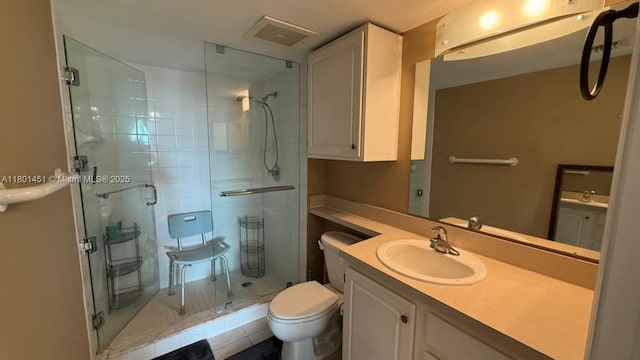 2665 SW 37th Ave Unit 1112, Miami, FL 33133 - bathroom with toilet, a stall shower, vanity, and tile patterned flooring