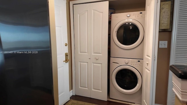 2665 SW 37th Ave Unit 1112, Miami, FL 33133 - laundry area with stacked washer / dryer