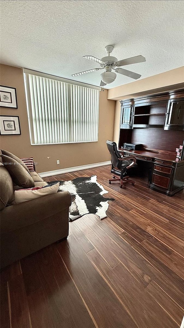 2665 SW 37th Ave Unit 1112, Miami, FL 33133 - living area with a textured ceiling, ceiling fan, wood finished floors, and baseboards