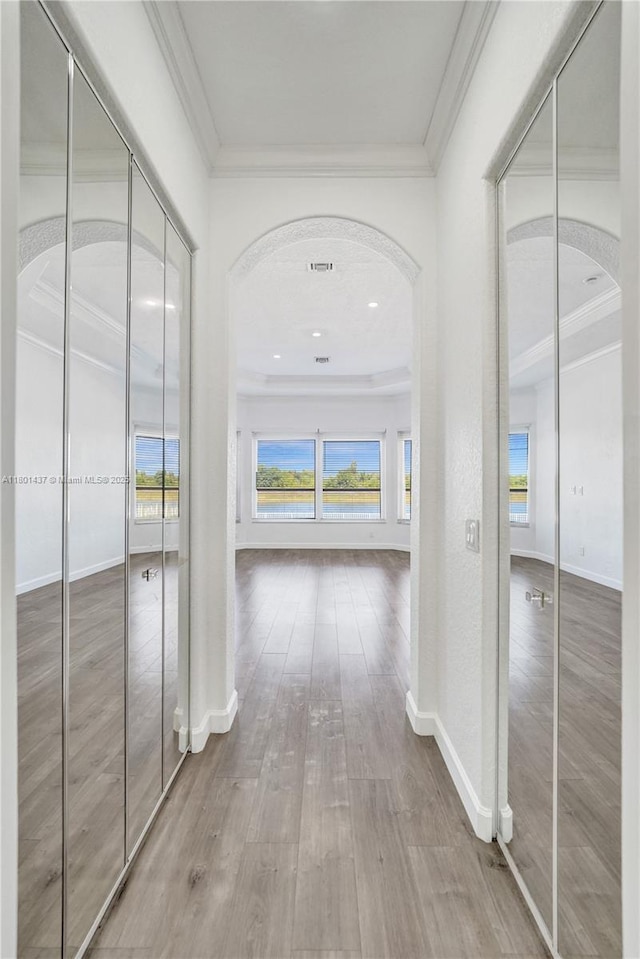 3360 SW 195th Ter, Miramar, FL 33029 - hallway featuring ornamental molding, wood finished floors, arched walkways, and baseboards