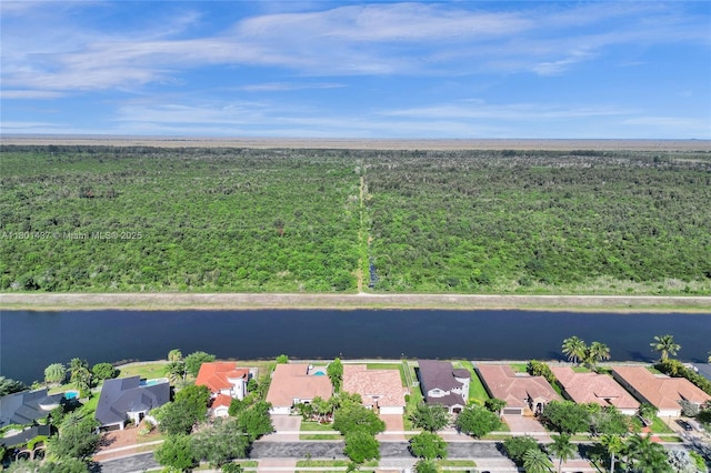 3360 SW 195th Ter, Miramar, FL 33029 - aerial perspective of suburban area featuring a nearby body of water and a forest