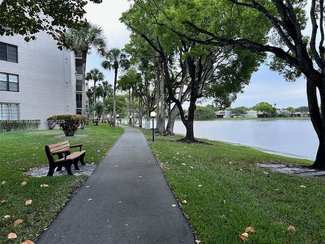 1000 Colony Point Cir Unit 302, Pembroke Pines, FL 33026 - view of home's community with a lawn and a water view