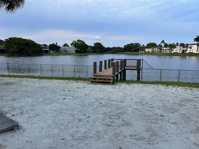 1000 Colony Point Cir Unit 302, Pembroke Pines, FL 33026 - dock featuring a water view and fence