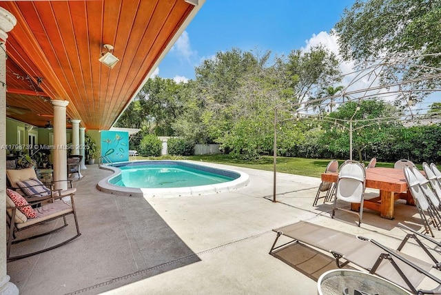 6551 SW 126th St, Pinecrest, FL 33156 - view of swimming pool with a patio, view of wooded area, and outdoor dining area