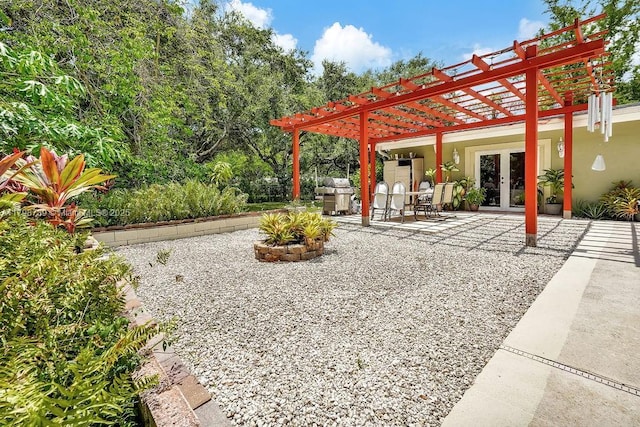 6551 SW 126th St, Pinecrest, FL 33156 - view of patio featuring a pergola, grilling area, and french doors