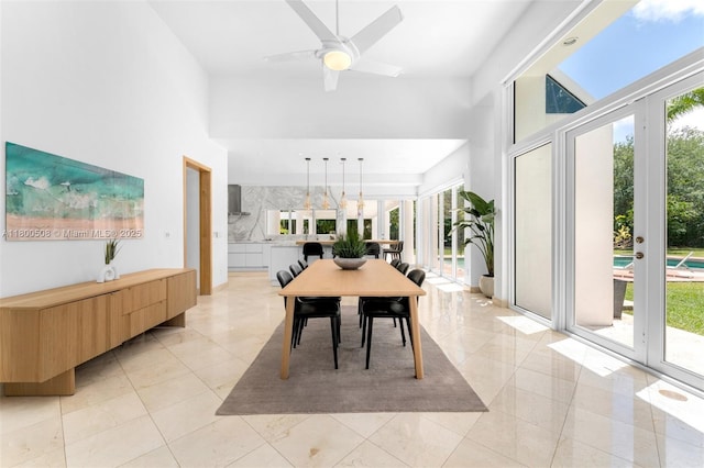 9500 SW 60th Ct, Pinecrest, FL 33156 - dining area featuring healthy amount of natural light, a towering ceiling, and a ceiling fan
