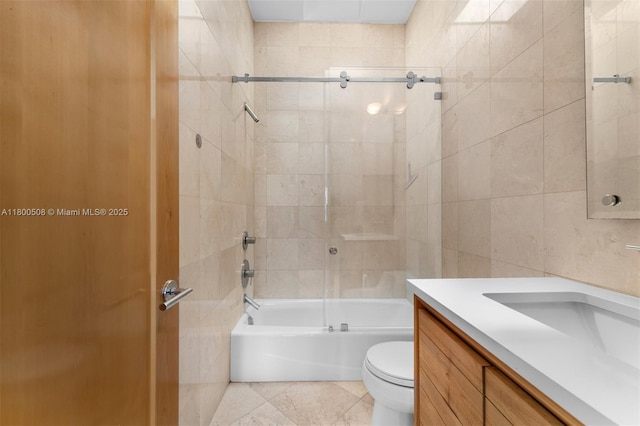 9500 SW 60th Ct, Pinecrest, FL 33156 - bathroom featuring tile walls, toilet, shower / tub combination, and vanity