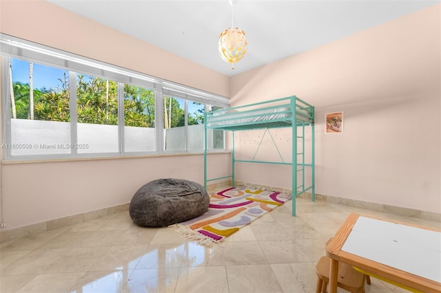 9500 SW 60th Ct, Pinecrest, FL 33156 - bedroom featuring multiple windows, a chandelier, and baseboards