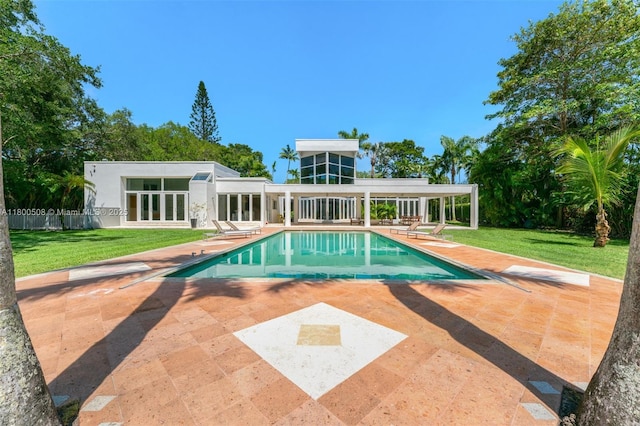 9500 SW 60th Ct, Pinecrest, FL 33156 - outdoor pool featuring a patio, french doors, and a yard