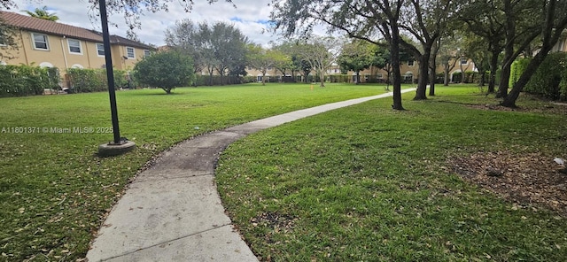 12708 SW 49th Dr, Miramar, FL 33027 - view of community featuring a lawn and a residential view