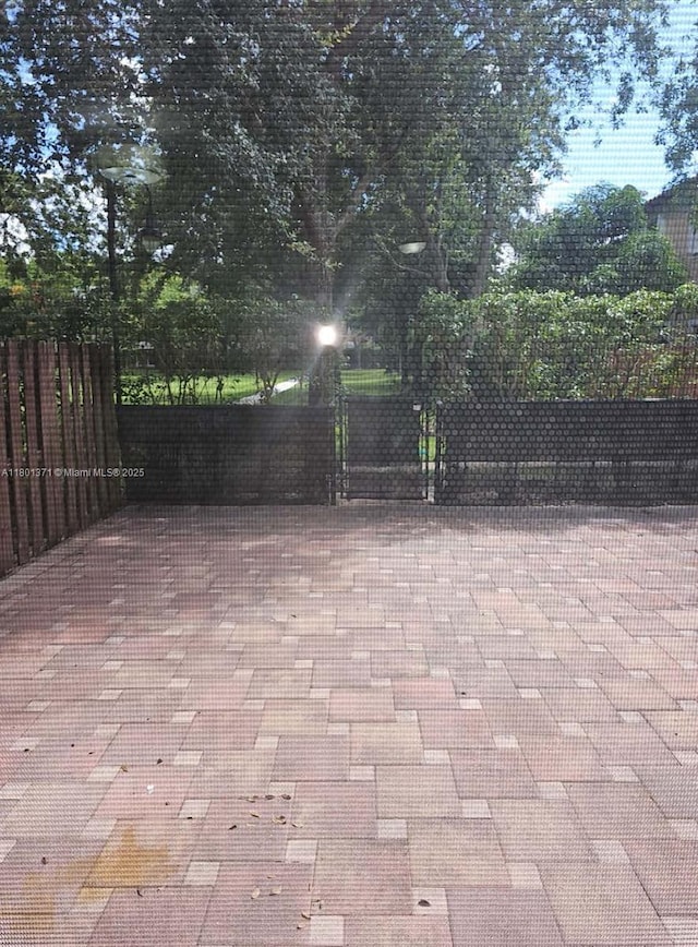 12708 SW 49th Dr, Miramar, FL 33027 - view of patio / terrace featuring a gate
