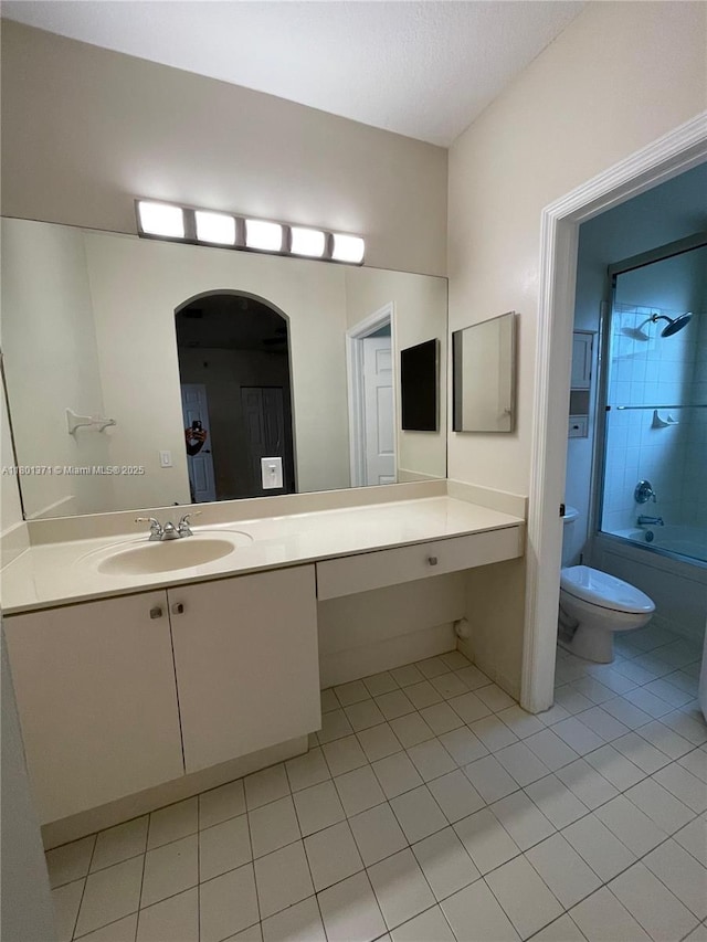 12708 SW 49th Dr, Miramar, FL 33027 - full bathroom with vanity, toilet, tile patterned floors, and shower / bathtub combination
