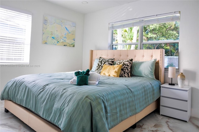 1649 NE 8th Ave, Fort Lauderdale, FL 33305 - bedroom featuring light marble finish flooring
